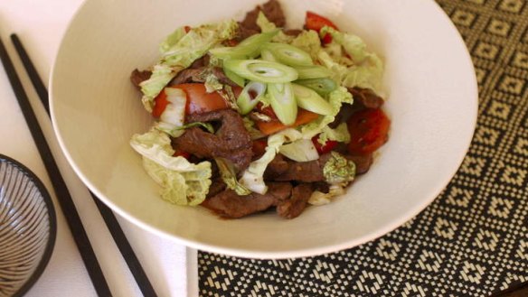 Dinner in a flash: Beef stir-fried with wombok and chilli.