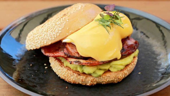 Bikini Blowout Benedict bagel with avocado and bacon.