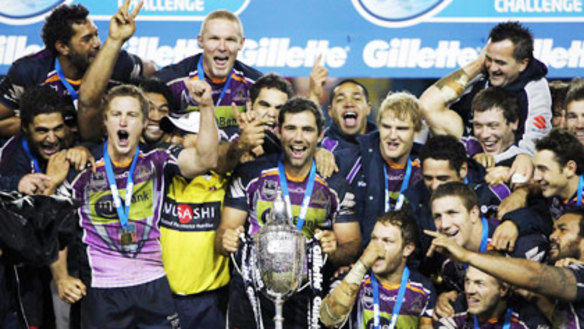 Melbourne Storm players celebrate their 2010 World Club Challenge victory.