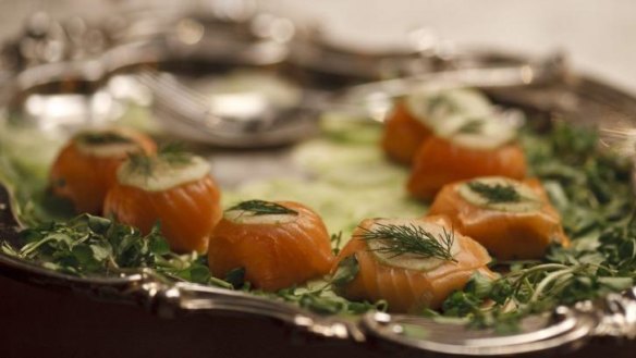 SIlver (screen) service: a platter of salmon and dill on set.