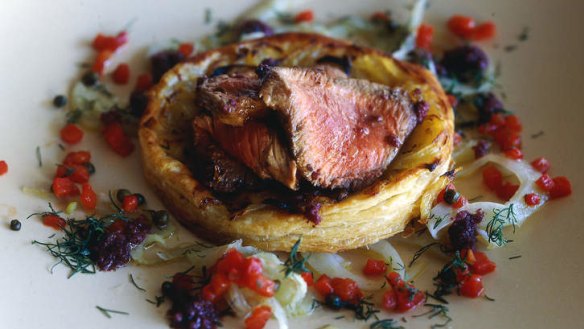 Spiced lamb loin with fennel, capsicum and onion tart