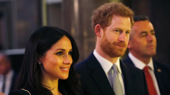 Prince Harry and Meghan Markle attend a reception at Australia House in London, Saturday, April 21.