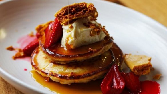 Pikelets with sweet ricotta, strawberries and honeycomb.
