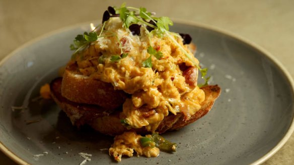 A tumble of chilli-infused scrambled eggs on toast.
