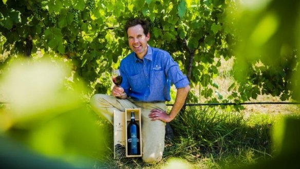 Mount Majura Vineyard winemaker Frank van de Loo with his 2013 Tempranillo.