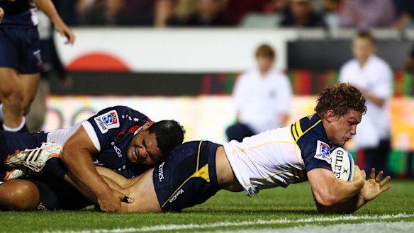 Michael Hooper of the Brumbies scores during the round eight Super Rugby match between the Brumbies and the Rebels at Canberra Stadium earlier this month.