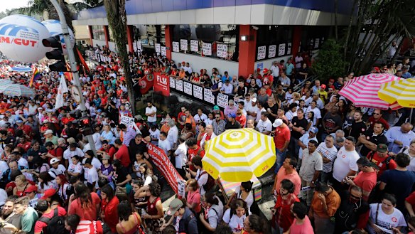Supporters of Brazil's former President Luiz Inacio Lula da Silva gather in front of the metal workers union headquarters in Sao Bernardo do Campo, Brazil.