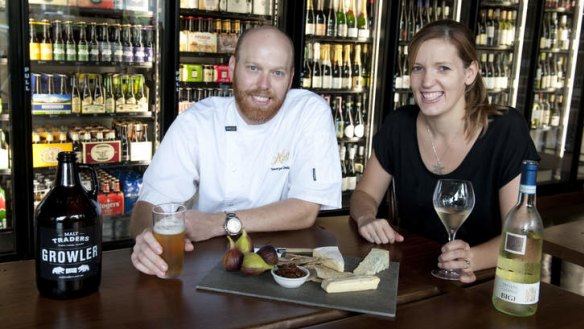 Chef George Clegg and sommelier Lucy George inside Malt Traders.
