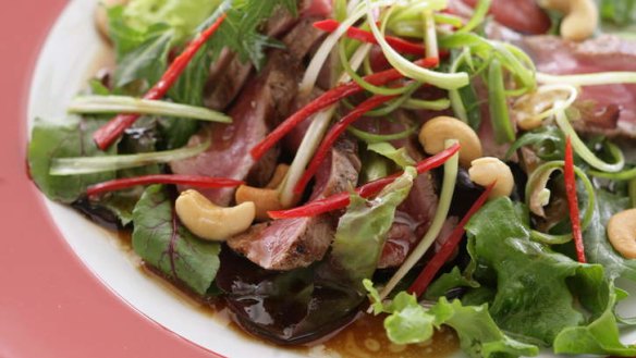 Rare beef salad with hot soy and chilli.
