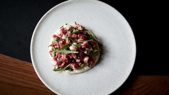 Steak tartare with radish, coastal rocket and and creme fraiche.