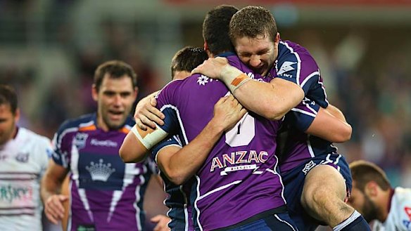Regeneration ... Storm players celebrate last weekend's preliminary final win over Manly.