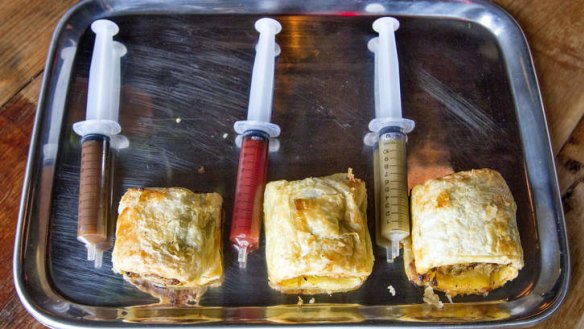 "Phat" sausage rolls come with injectable syringes of sauce.