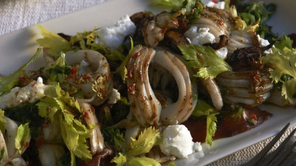 Calamari salad with jamon, curly endive and goat cheese.
