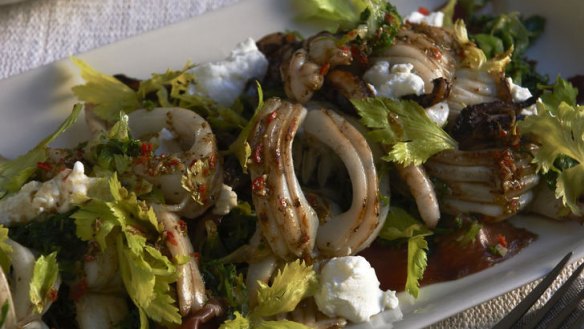 Calamari salad with jamon, curly endive and goat cheese.