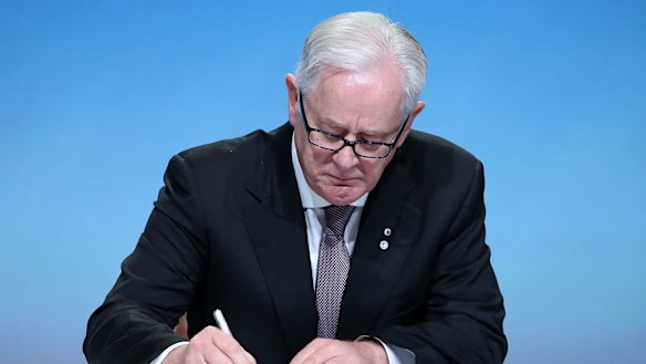 Minister of Trade and Investment Andrew Robb signs the Trans Pacific Partnership on Thursday.
