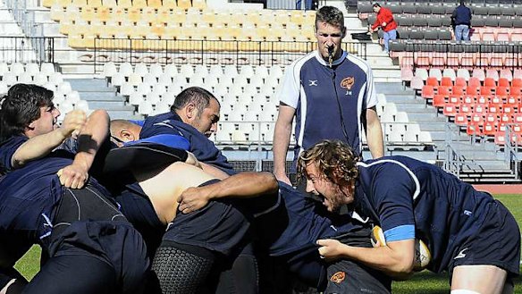 Voice of experience: Harrison helps coach the forwards at club Narbonne.