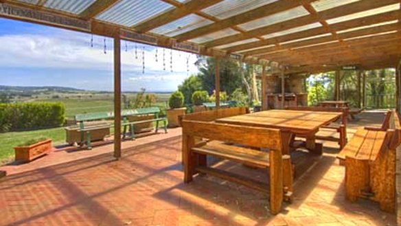 Purple patch ... Lavender Views homestead looks out over the valley and Cambewarra Range.