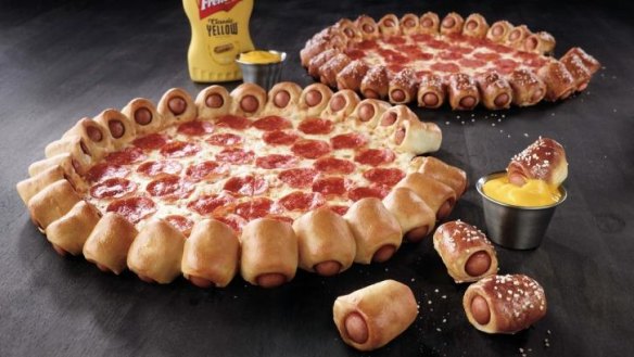 Stuffed-crust behemoth: The new pizza features 28 "premium hot dog bites" baked into the crust.