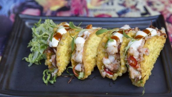 Bubbly Bangkok tacos with spicy prawn larb.