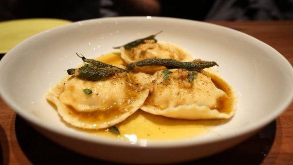 Ravioli with pumpkin, buffalo ricotta, burnt sage butter, and walnut aillade at Two Chaps Nights.