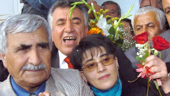 Leyla Zana, right, and fellow MP Selim Sadak are greeted by supporters in Ankara in 2004 after a decade in jail.