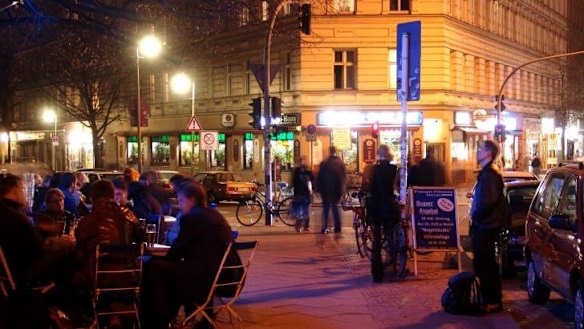 The open restaurants and bars in the streets of Neukolln in Berlin.