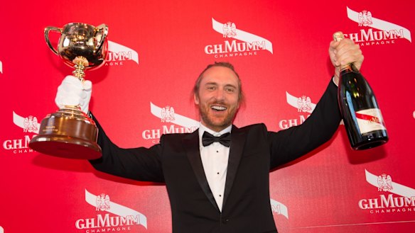 DJ David Guetta living it up in the Mumm marquee at the Melbourne Cup.