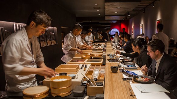 Chefs at Kisumé’s sushi bar face the diners.