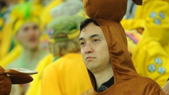 Heading home ... An Australia fan watches on.