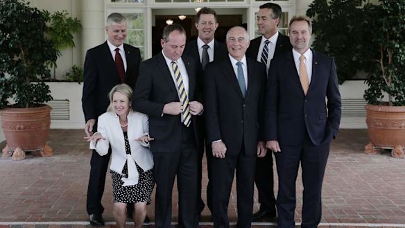 Nationals MPs pose for photos afer the swearing in ceremony at Government House in Canberra on Wednesday.