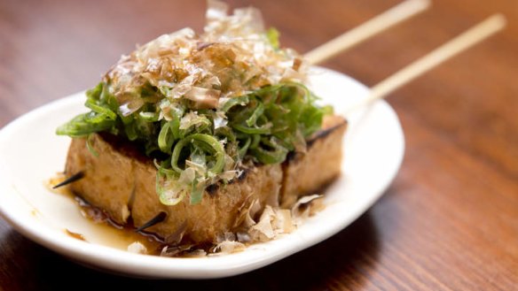 Deep-fried organic tofu with shallots and bonito flakes.