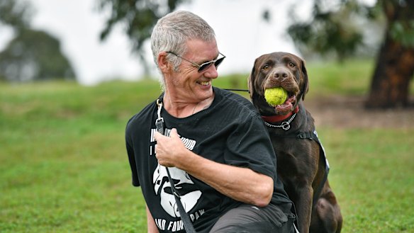 Ron Fenton with his trauma dog, Yogi.