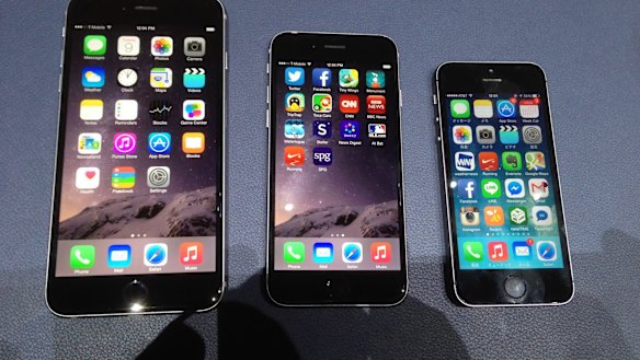 The Apple iPhone 6 Plus and 6, next to the smaller iPhone 5S.