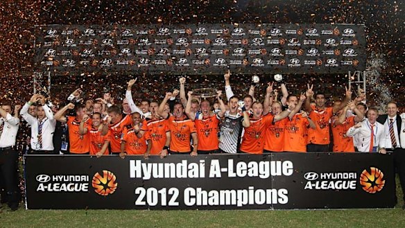 Roar players celebrate their victory.