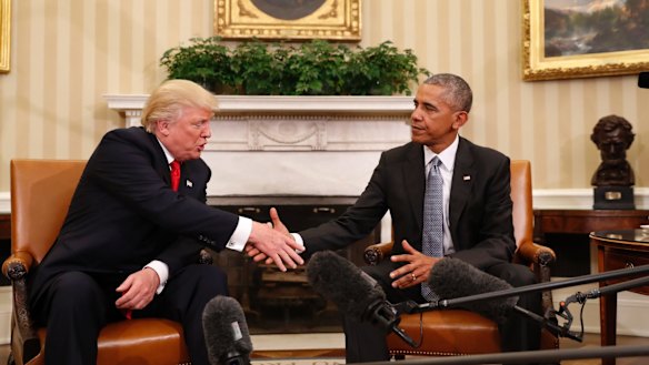 President Barack Obama shakes hands with president-elect Donald Trump in the Oval Office.