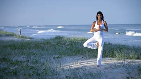 Poise ... sand-in-the-toes yoga.