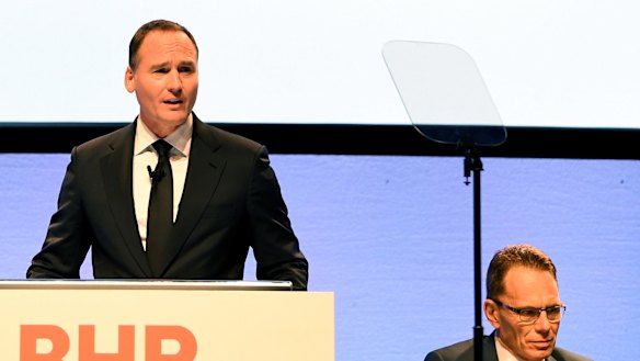 BHP chairman Ken MacKenzie (left) and chief executive Andrew Mackenzie faced a shareholder resolution at the company's AGM in November.