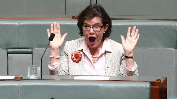 Independent MP Cathy McGowan reacts to the answer from Assistant Infrastructure Minister Jamie Briggs. Photo: Alex Ellinghausen
