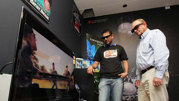 'Bigger brands are worth paying for' ... Gary Harvey tests out his 3D TV range.