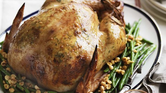 Neil Perry's roast turkey with ricotta stuffing and a side of green beans with hazelnuts.