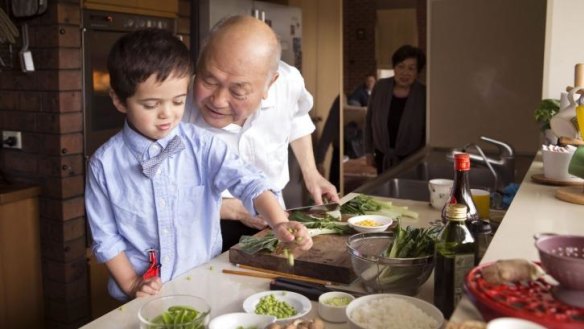 Next generation: Gilbert Lau gets a helping hand from grandson Teddy.