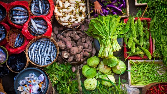 Colourful fish and vegetables from Ubud public market.