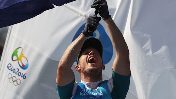RIO DE JANEIRO, BRAZIL - AUGUST 16: Tom Burton of Australia celebrates winning the gold medal in the Men's Laser class on Day 11 of the Rio 2016 Olympic Games at the Marina da Gloria on August 16, 2016 in Rio de Janeiro, Brazil. (Photo by Clive Mason/Getty Images) *** BESTPIX ***