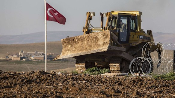 A bulldozer belonging to the Turkish army at the site 200 metres from the Turkish-Syrian border to which Suleyman Shah's remains were relocated.
