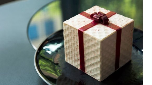 This white chocolate and raspberry 'gift' at QT Melbourne is a dessert with a surprise