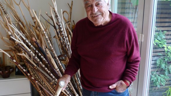 Chef and restaurateur Antonio Carluccio, with his collection of walking sticks he has carved from hazel branches, something he's done all of his life. Each includes a mushroom carved into the top.