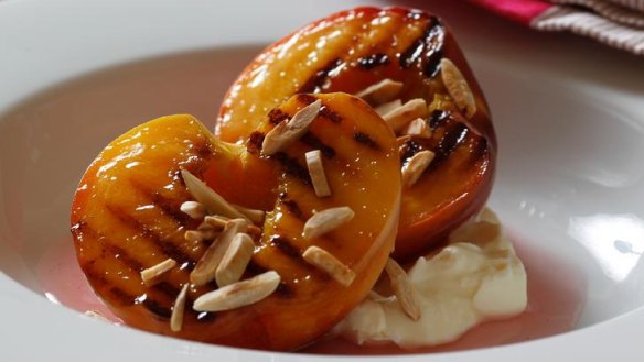 Warm peaches with creamy ricotta and rosewater syrup.