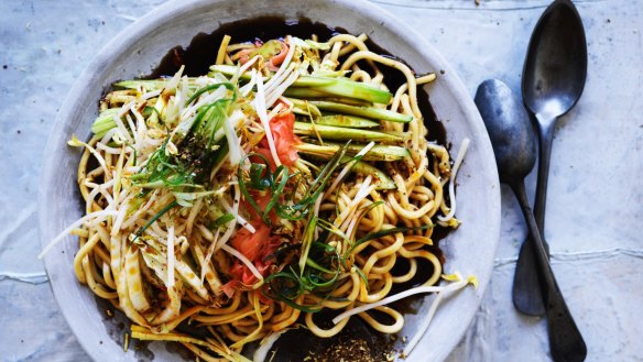 Cool noodles, cabbage and cucumber sprinkled with spicy Sichuan pepper.