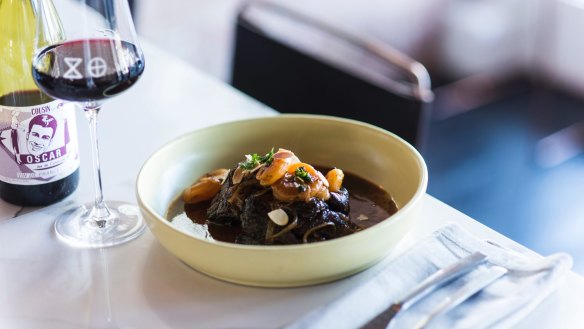 Slow-cooked goat with caramelised onions and apricots.