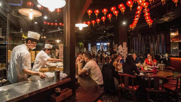 Chefs prepare batches of dumplings at New Shanghai's flagship.